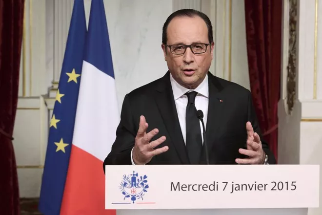 French President Francois Hollande delivers a speech at the Elysee Palace in Paris, after a shooting at the Paris headquarters of satirical weekly Charlie Hebdo killing at least 12 people and injuring many, on January 7, 2015. French President Francois Hollande announced Thursday would be a day of mourning in the wake of the attack on satirical newspaper Charlie Hebdo that left at least 12 dead. AFP PHOTO/POOL/PHILIPPE WOJAZER