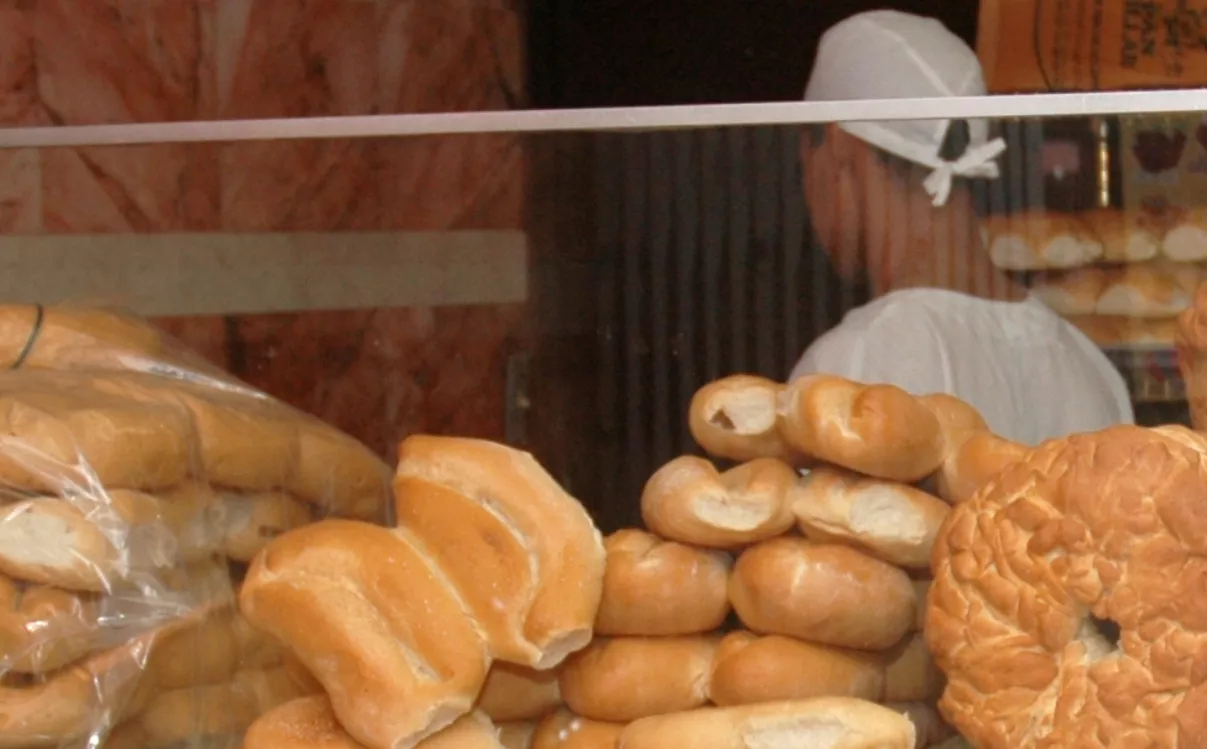 Pan. panadero y alza del pan de agua