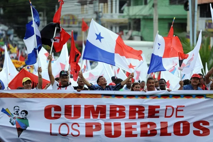 People march before the opening of the Peoples Summit to be held in parallel with the VII Americas Summit, in Panama City on April 9, 2015. Regional leaders begin to arrive for a historic Summit of the Americas that will see the US and Cuban presidents sit face to face for the first time in decades.  AFP PHOTO / JOHAN ORDONEZ