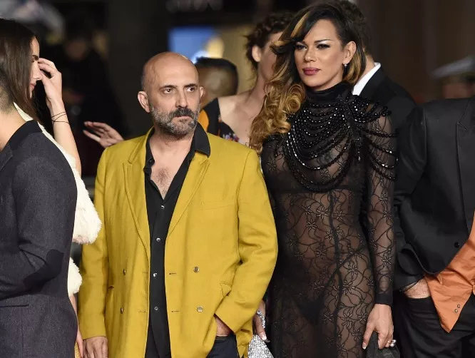 Argentinean director Gaspar Noe (L) arrives for the screening of his film "Love" at the 68th Cannes Film Festival in Cannes, southeastern France, on May 20, 2015. AFP PHOTO / LOIC VENANCE