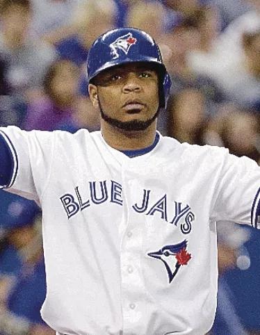Toronto Blue Jays Edwin Encarnacion throws his hands up after been brushed back with a close pitch in the fifth inning in Toront