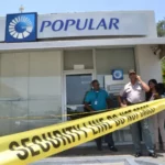 Asaltan sucursal del Banco Popular en la avenida Luperón y matan guardián
