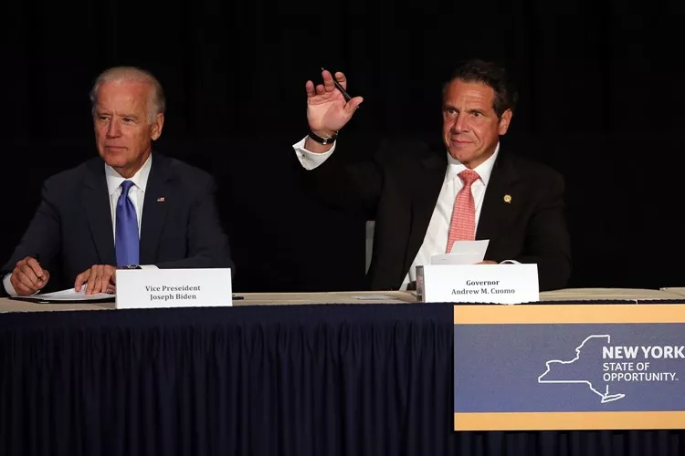 NEW YORK, NY – JULY 27: Vice President Joe Biden (L) appears with New York Gov. Andrew Cuomo to unveil plans for new area infrastructure projects on July 27, 2015 in New York City. The highlight of the event was an announcement that a new LaGuardia airport will be built, with construction starting next year. The new facility will will feature state-of-the-art security, transportation and shopping and dining options. The project is estimated to bring 8,000 new jobs to the area.   Spencer Platt/Getty Images/AFP== FOR NEWSPAPERS, INTERNET, TELCOS & TELEVISION USE ONLY ==