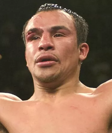 BOXING: PACQUIAO DETHONES MARQUEZ TO CLAIM SUPER FEATHER TITLE