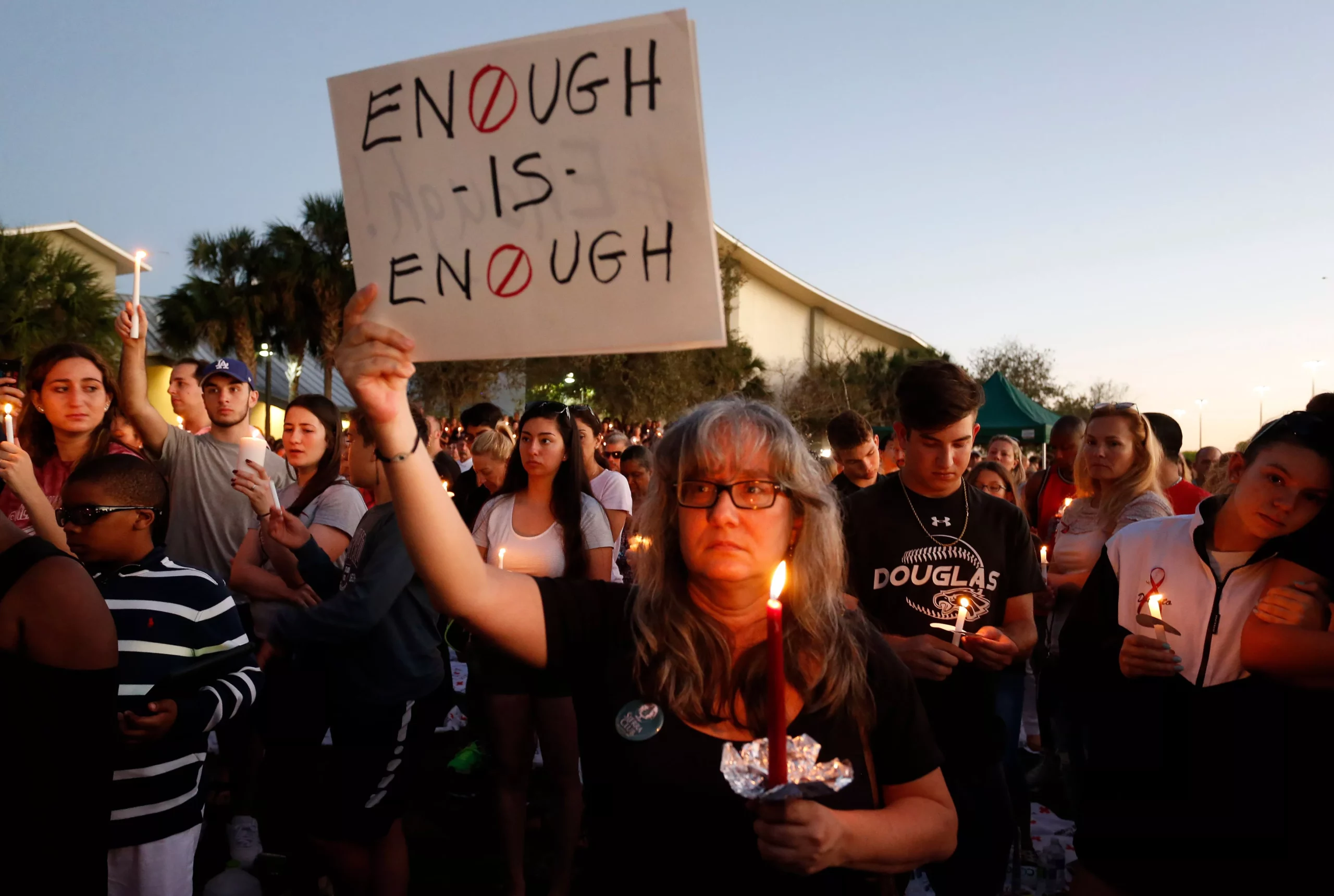 TOPSHOTS Mourners hold vigils in Florida town after 17 killed in high school shooting