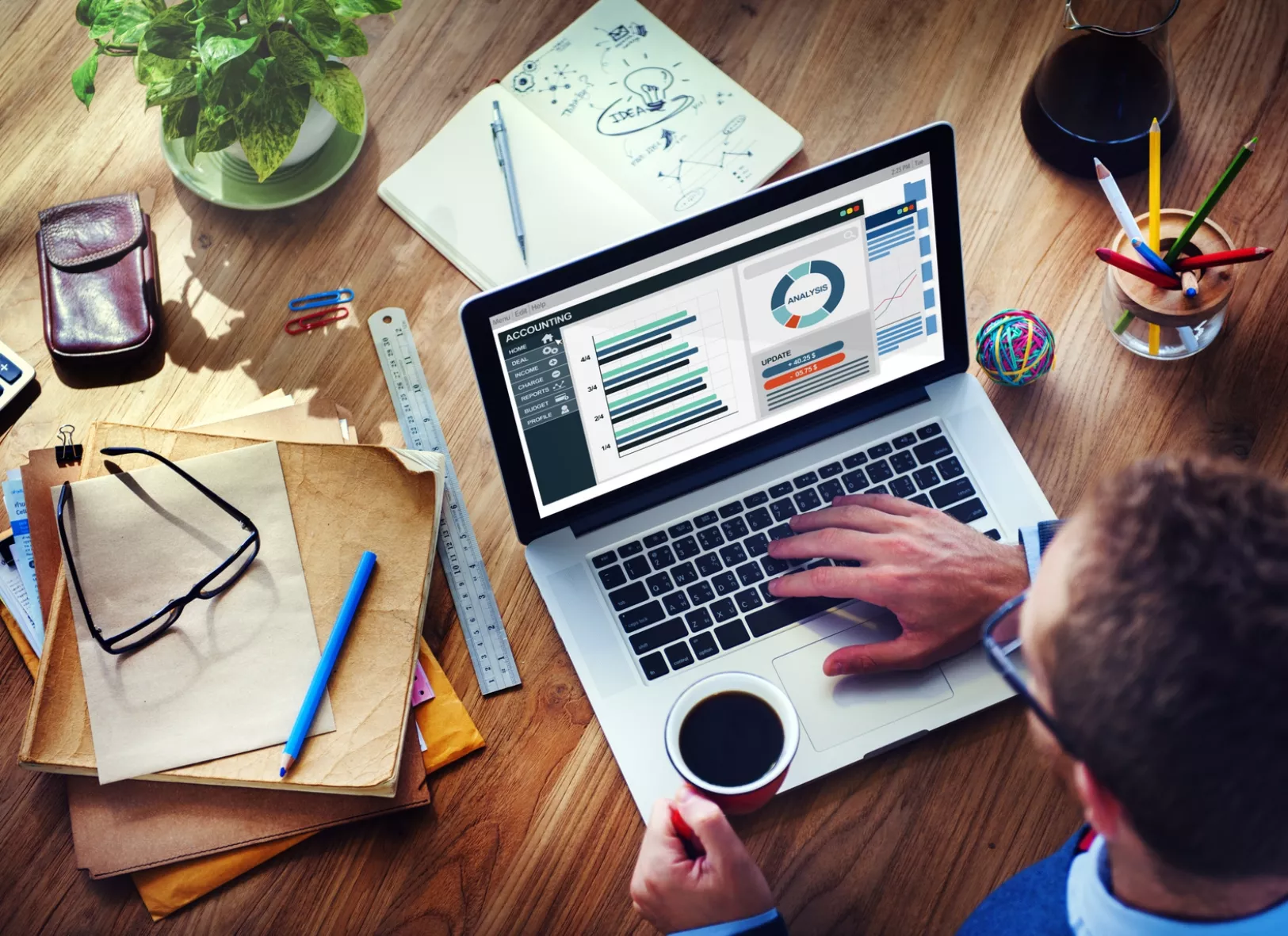 Man Analysis Business Accounting on Laptop