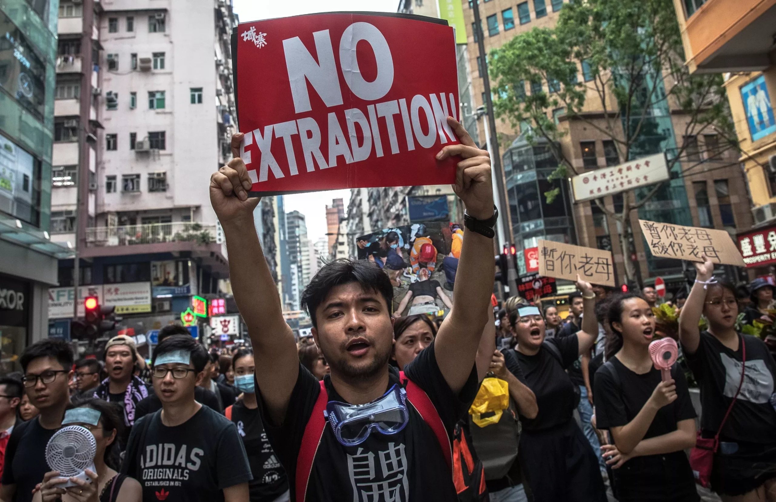 Protesters march to call for a complete withdrawal of the extradition bill.