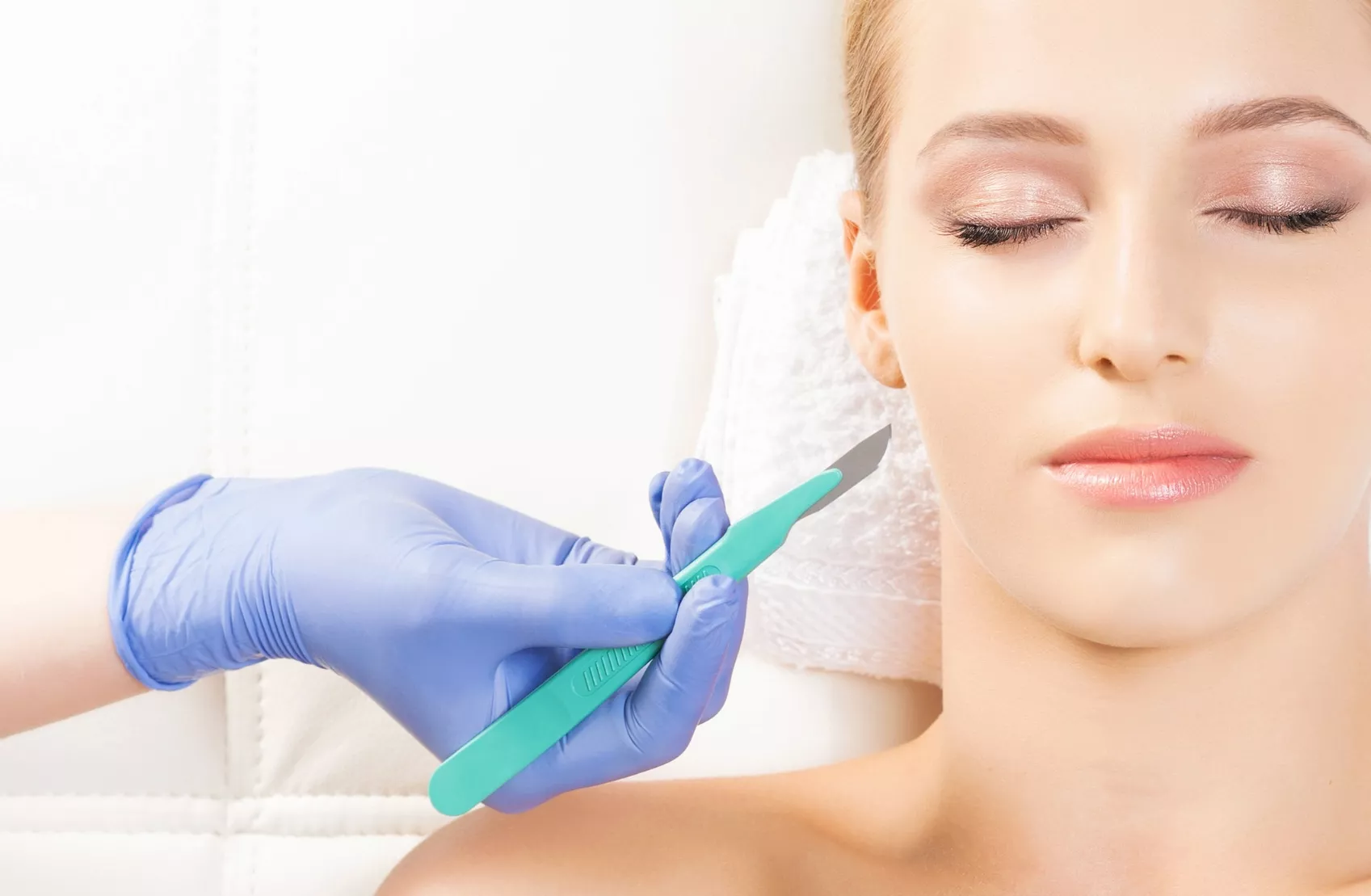 Beautiful woman getting face lifting operation. Aging and plasti