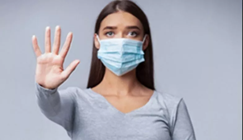 Pregnant Lady In Medical Face Mask Gesturing Stop In Studio