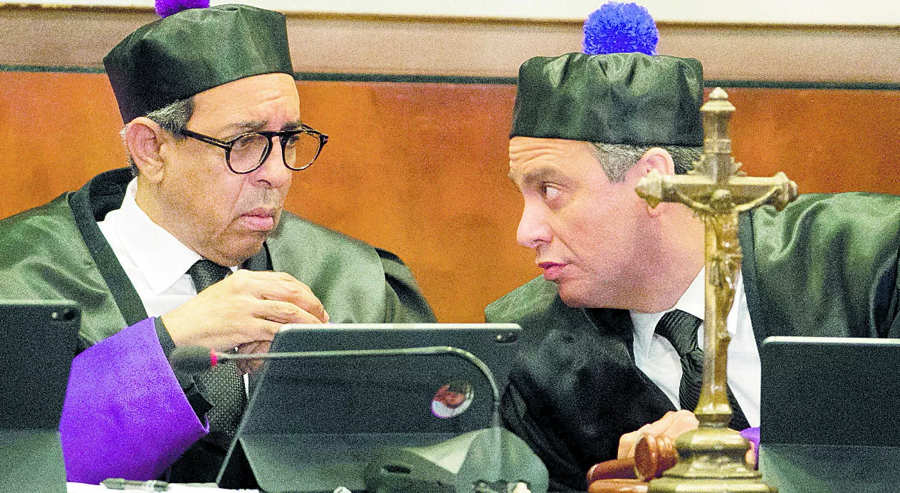 El presidente de la SCJ, Luis Henry Molina, y el vicepresidente Herrera Carbuccia.