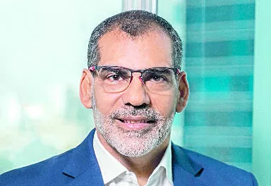 Luis Bencosme, CEO de la compañía CardNET.
