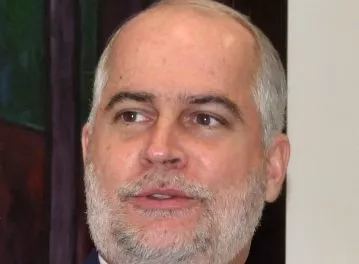 Alejandro Fernández W., superintendente de Bancos.