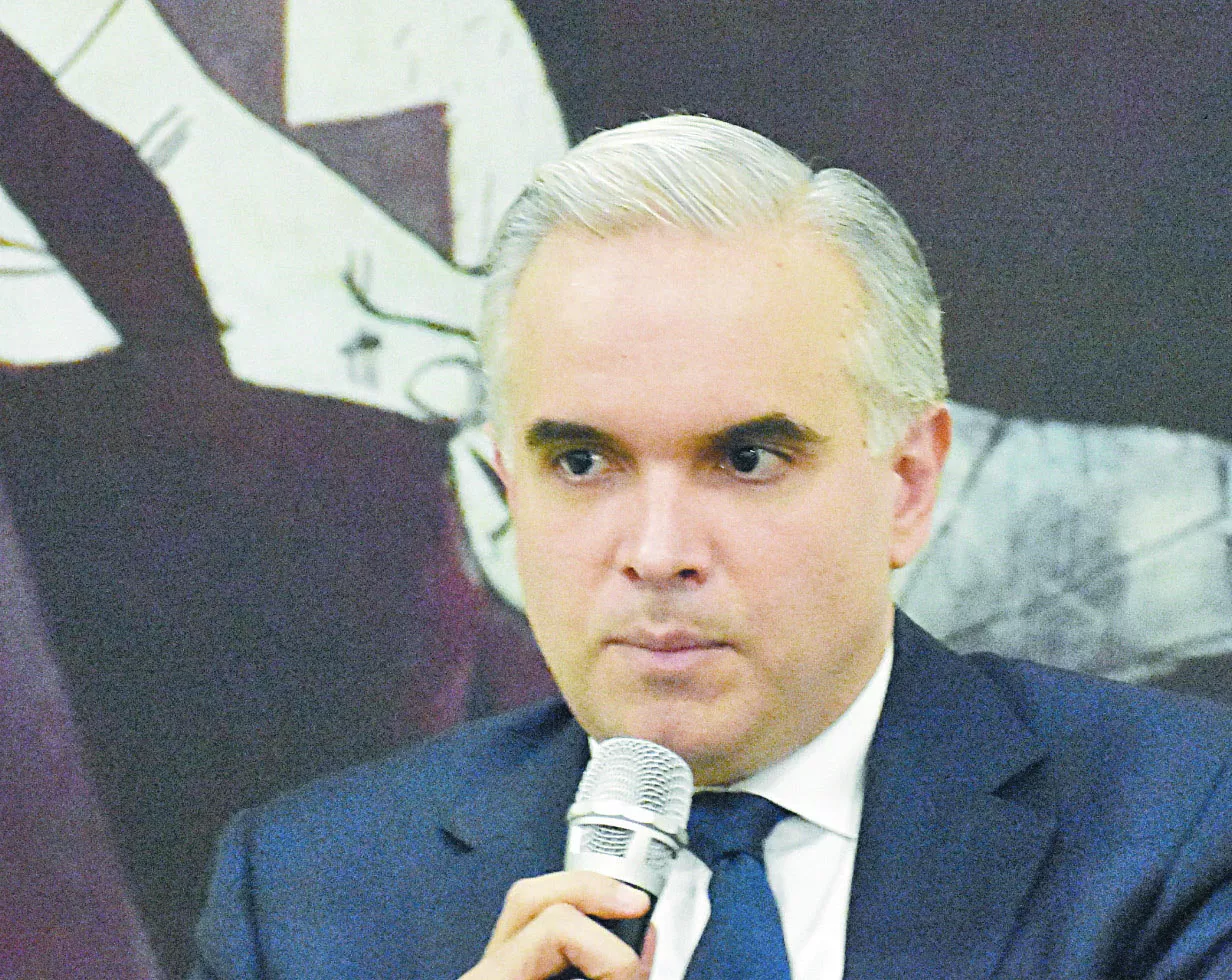 Luis Miguel De Camps, ministro de Trabajo y presidente del CNSS.  José de león