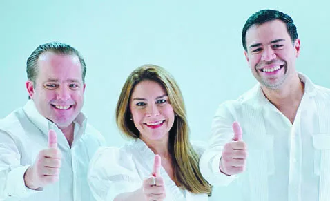 Roberto ángel Salcedo junto a Paliza y  Carolina.