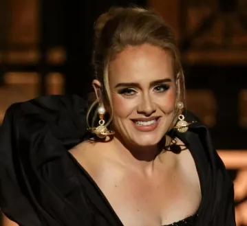 Adele lleva una línea de ganar todos los premios.