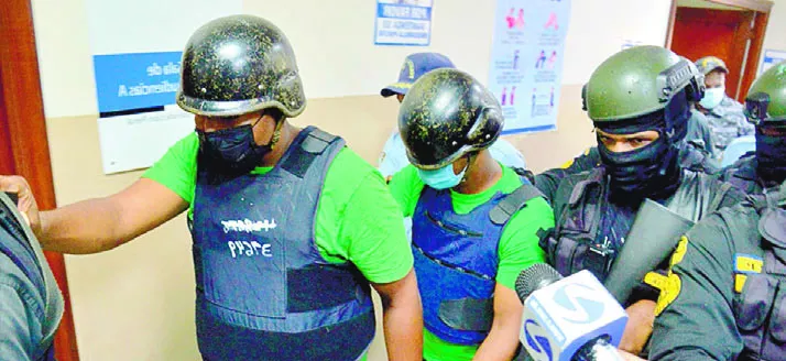 El policía Janli Disla Batista y Rafael Castillo Nova, enviados al CCR de SPM.
