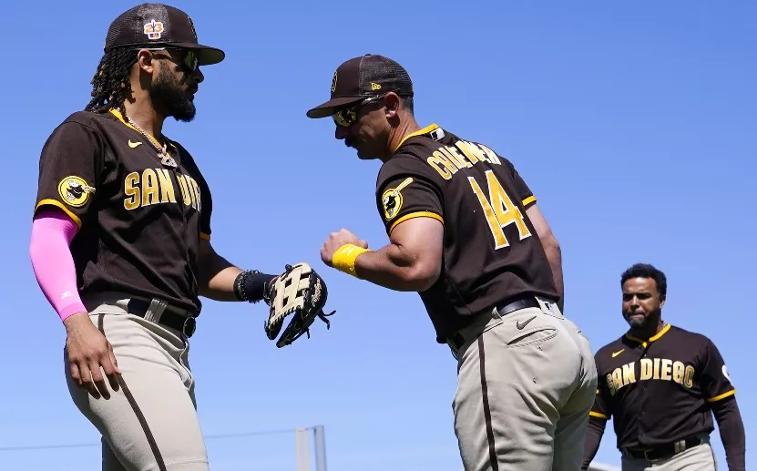Fernando Tatis Jr.,  Matt Carpenter y Nelson Cruz, de los Padres.