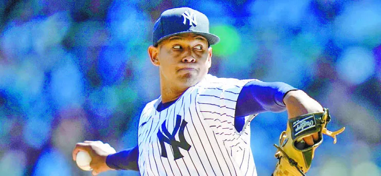El dominicano Jhony Brito se adueñó ayer del Yankee Stadium en su estupendo debut.  AP