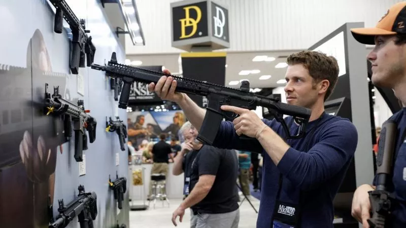 _129318110_reuters_manwithar15