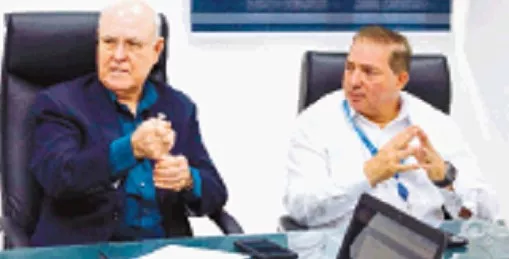 Javier Rodríguez junto al director general del IDAC, Héctor Porcella.