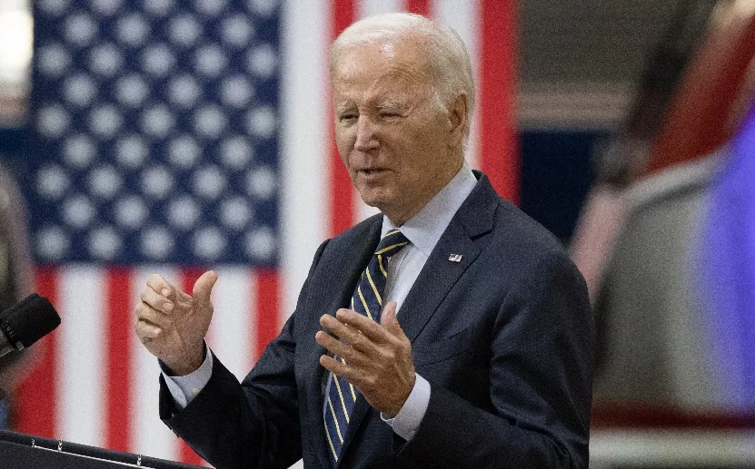 US President Joe Biden visits an Amtrak facility