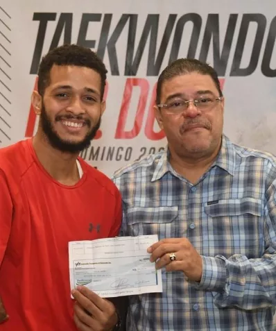 El ministro Francisco Camacho junto a Geraldo Castro.