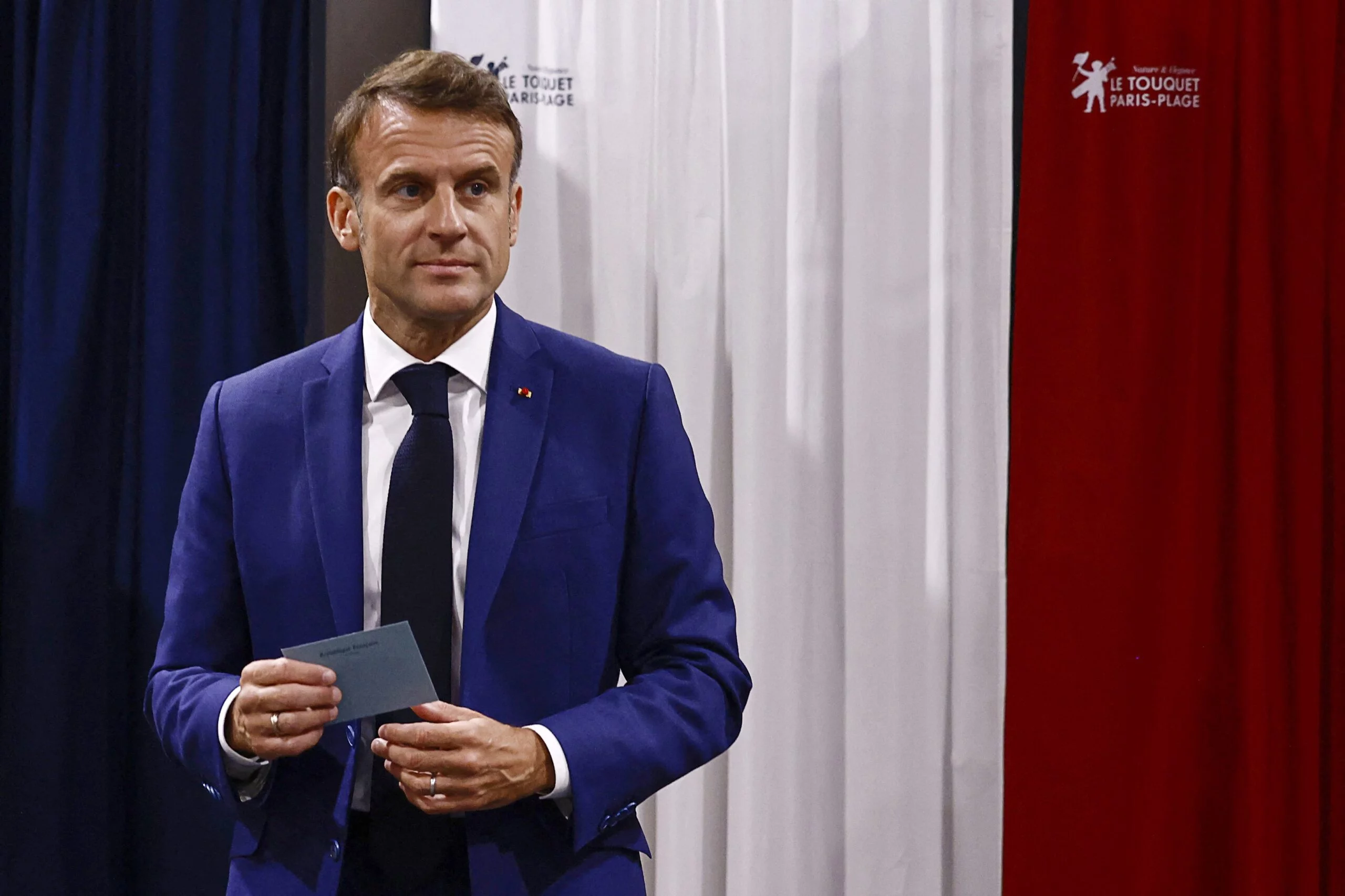 French President Macron votes in the first round of the 2024 snap legislative elections