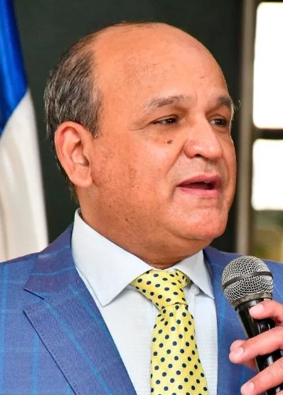 Iván García, presidente de la Federación de C	omerciantes.
