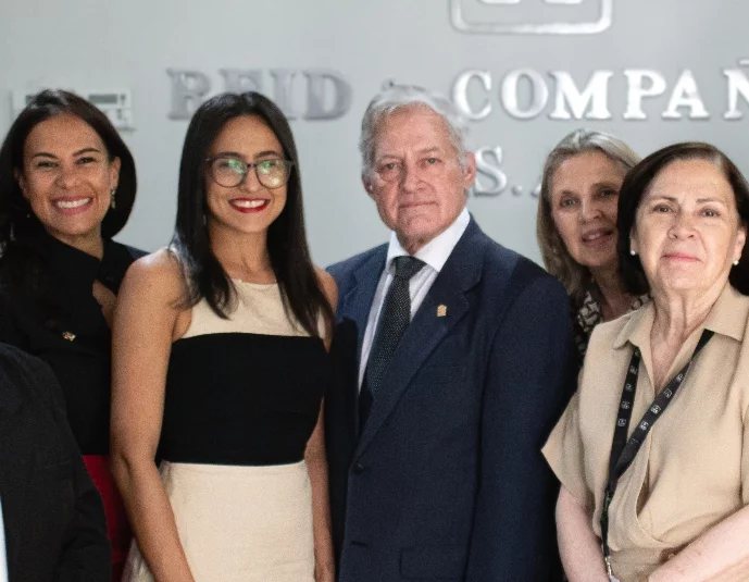 Ejecutivos de Reid & Compañía y de ANEIH.