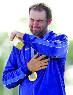 Scottie Scheffler, logró el oro con un 9 bajo par.