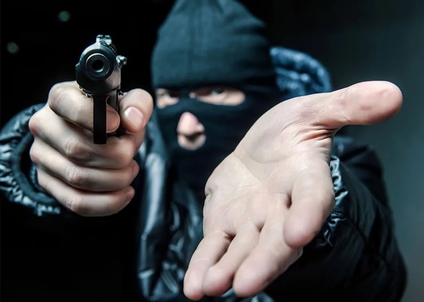 a punta de pistola